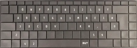 Laptop keyboard with flattened custom splitted Colemak DH layout.